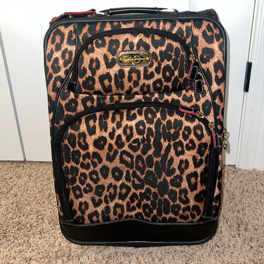 Jessica Simpson luggage in leopard color
